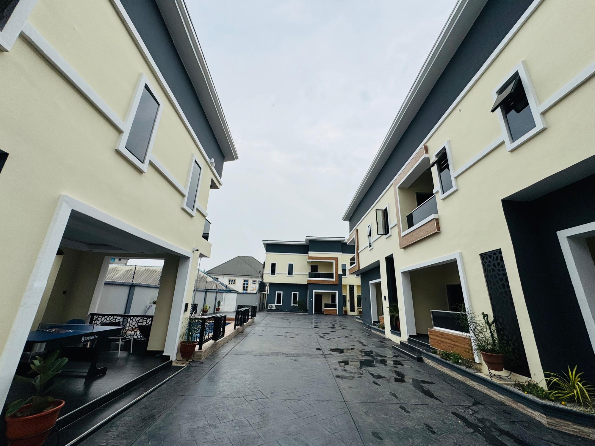 The walkway between the apartment blocks inside the gated estate